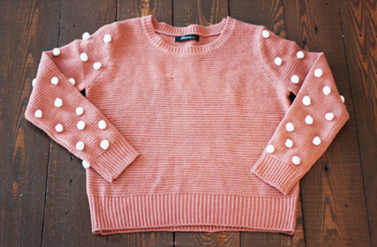como hacer un jersey con pompones